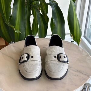 Off White Flats with Black Metallic Buckle